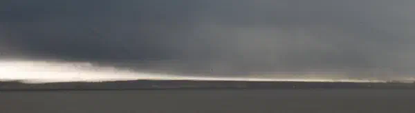 A thunderstorm is catching and overtaking us on our way back on the Staten Island Ferry