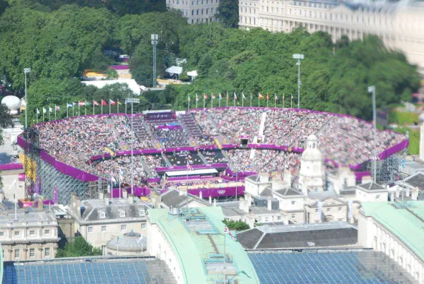 Distorted photo (by the glass of the cabin of the London Eye) of the Horse Guards Parade beach volleyball venue